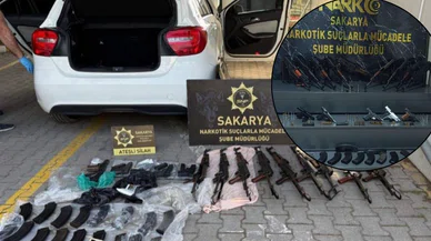 Polis memurunun kullandığı araçtan cephanelik çıktı