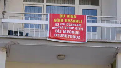 Bu pankartı görenler bir kez daha okuyor