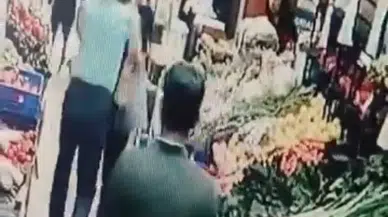 Alışveriş yapan kadına yumruklu saldırı