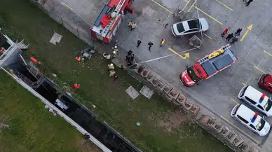 Otoparktan çıktı, araçlara vura vura boşluğa düştü