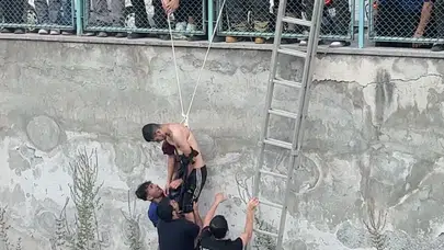 Arkadaşı için ölümüne o kanala atladı