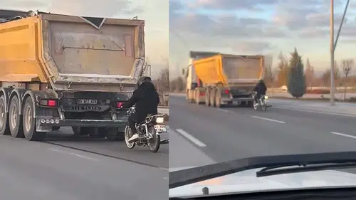 Konya'da seyir halindeki tırın peşinde motosikletli tehlikeli yolculuk