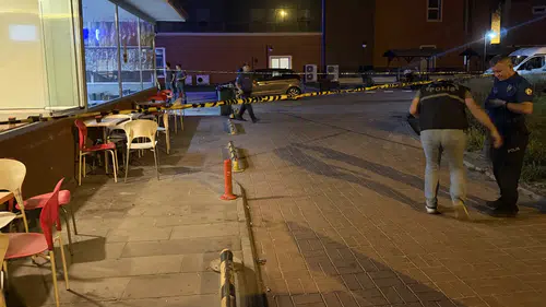Hastane kantininde boşanma aşamasındaki eşine silahla ateş etti
